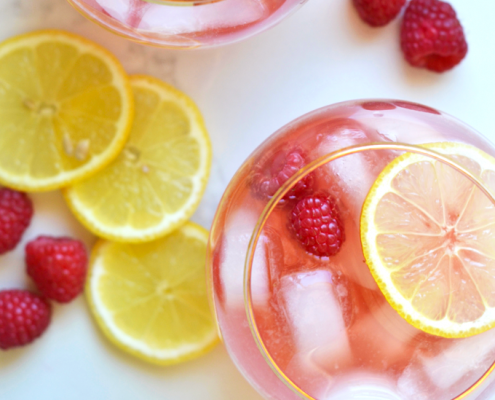 This Raspberry Lemon Kombucha Sangria is the perfect fresh way to celebrate the summer! Packed with flavor and probiotics!