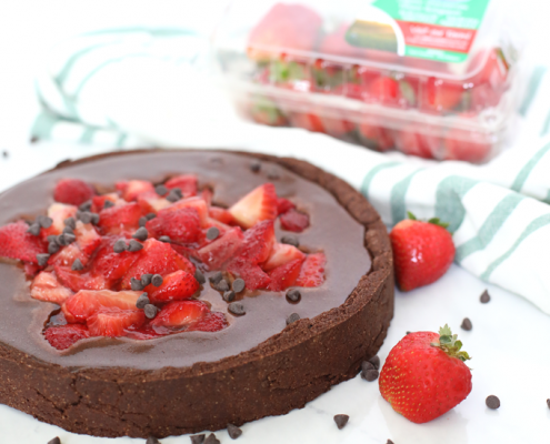 This Strawberry Covered Flourless Chocolate Tart is a delicious and rich dessert that everyone will love! Totally paleo and you would never know it.